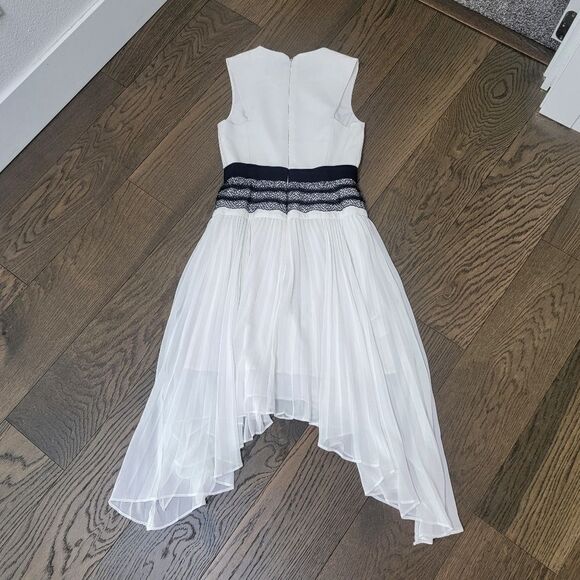 BCBGMAXAZRIA Adelyn Pleated Lace Sleeveless Hi Low Dress in White & Black - Picture 9 of 16